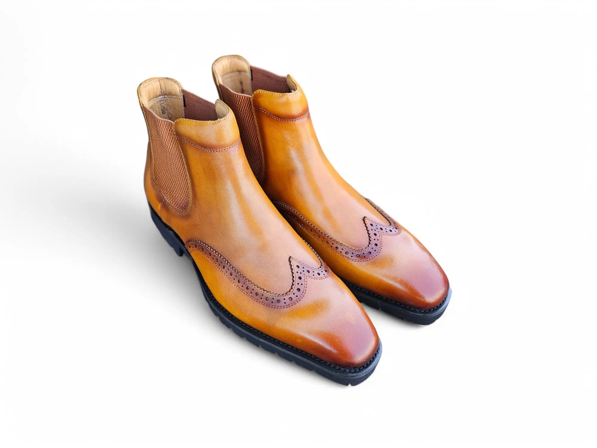 Lug Sole Chelsea Boot with Wingtip Toe Carrucci