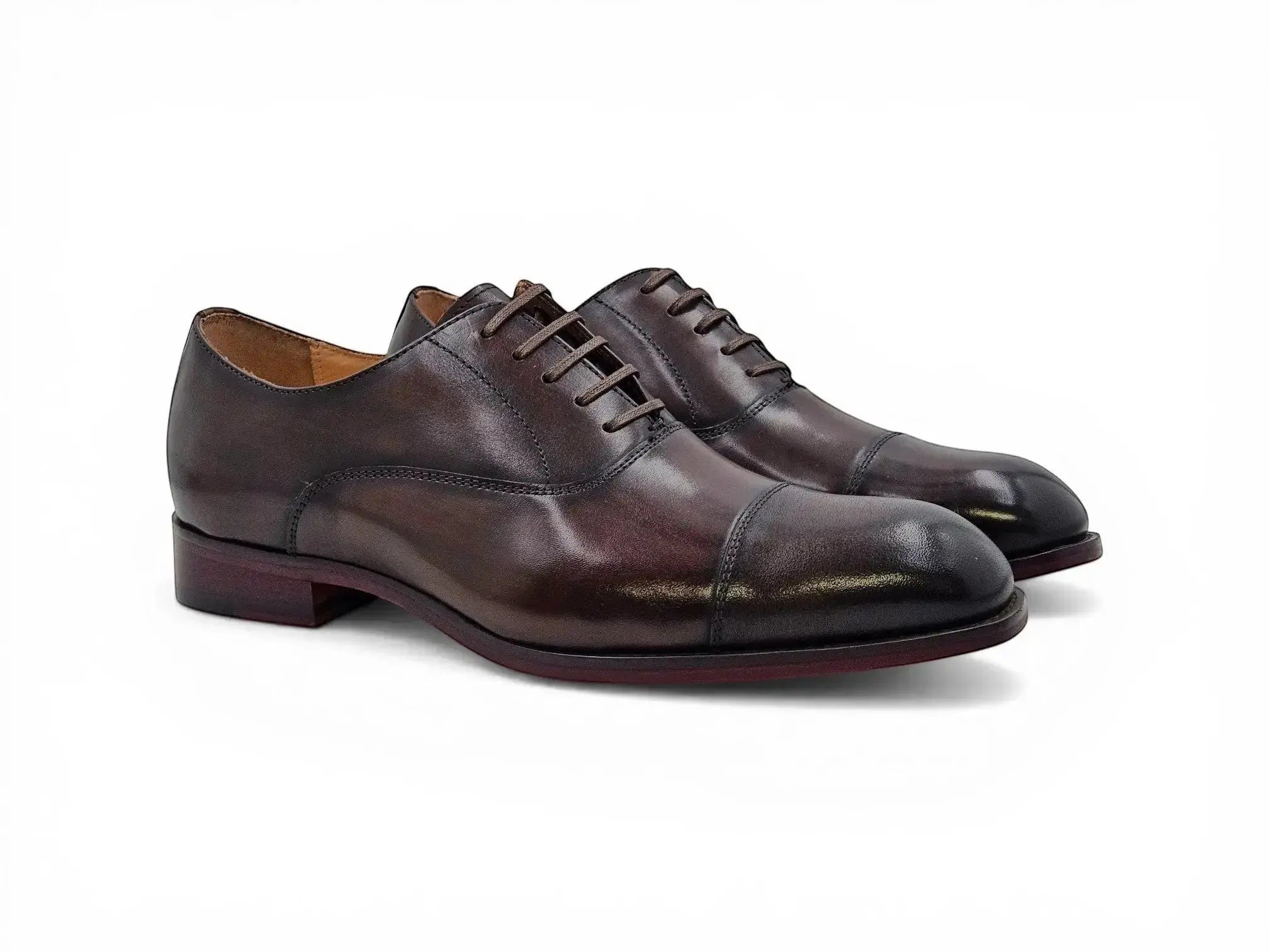 Carrucci Shoes men's dark brown leather cap toe oxford dress shoes with a leather sole.